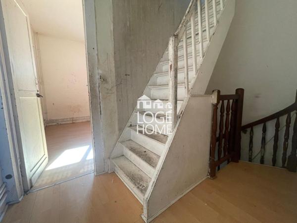 Maison- 4 chambres beau potentiel