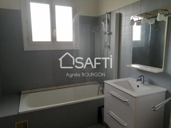 Immeuble composé de deux T4 avec garage et jardin