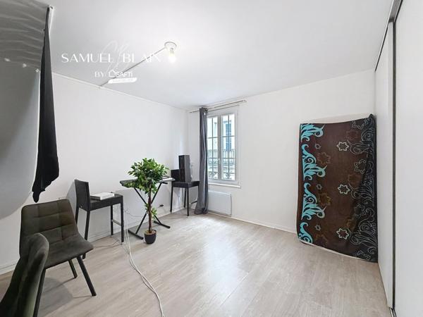 Salon poutres apparentes, T4 duplex 3 chambres