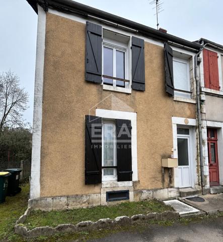 Maison de caractère avec garage - Investissement