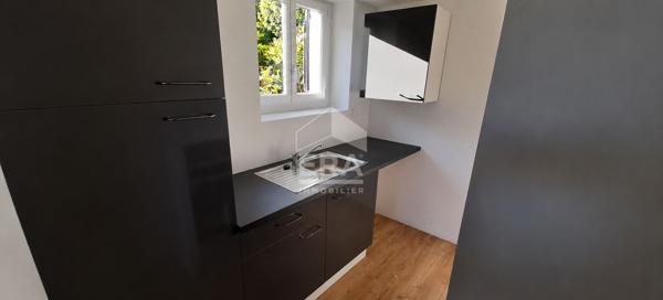 Maison de caractère avec garage - Investissement