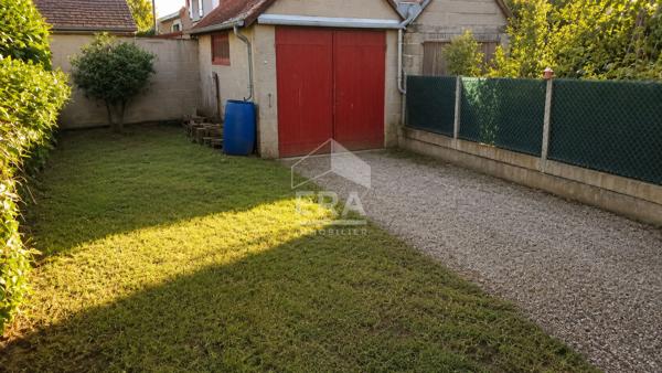 Maison de caractère avec garage - Investissement