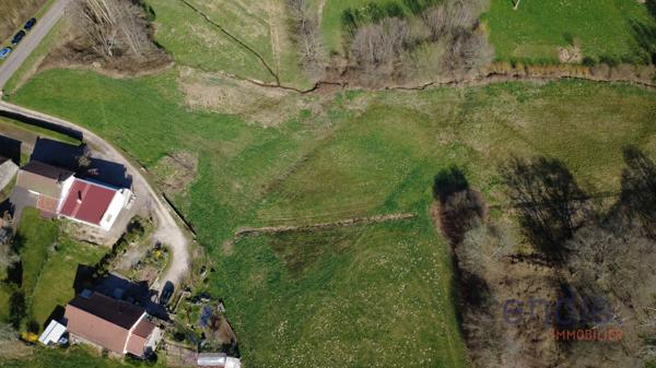 À Vendre – Terrain avec Parcelle Constructible et Options d’Agrandissement, à Belmont (70270)