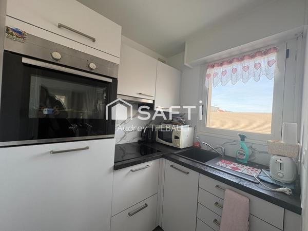 APPARTEMENT AVEC BALCON ET PLACE DE STATIONNEMENT