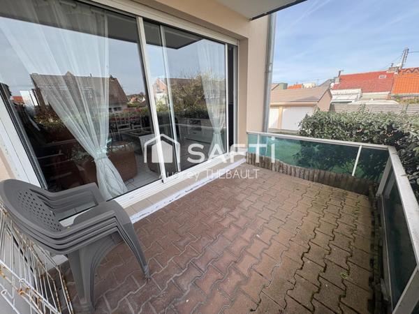 APPARTEMENT AVEC BALCON ET PLACE DE STATIONNEMENT