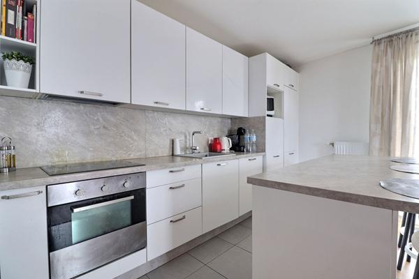 Appartement 3 pièces 59m² + place de parking en sous-sol