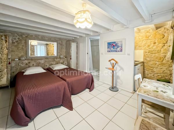 MAISON EN PIERRE + MAISONNETTE + GARAGE 10 PIECES 230 M²