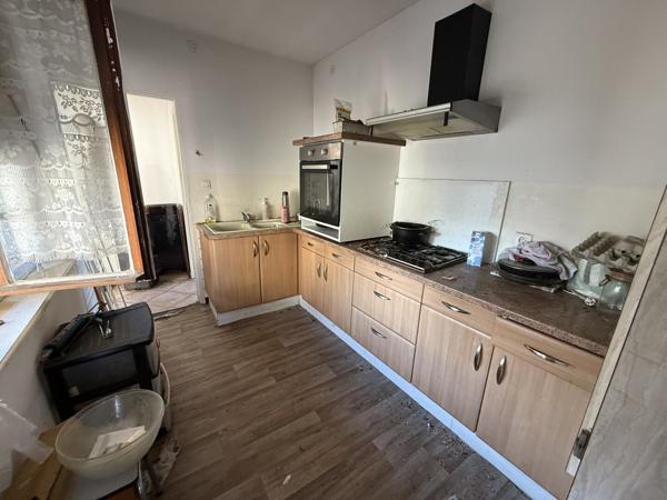 Maison d'environ 90 m² sur un terrain de 5,6 ares avec dépendances