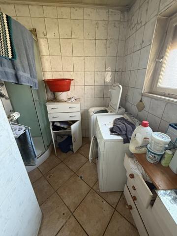 Maison d'environ 90 m² sur un terrain de 5,6 ares avec dépendances