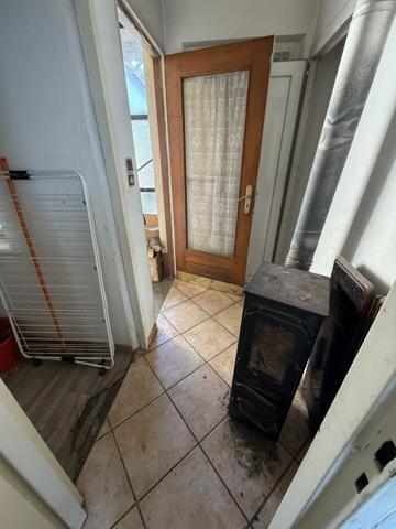 Maison d'environ 90 m² sur un terrain de 5,6 ares avec dépendances