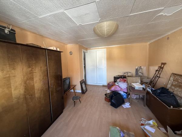 Maison d'environ 90 m² sur un terrain de 5,6 ares avec dépendances