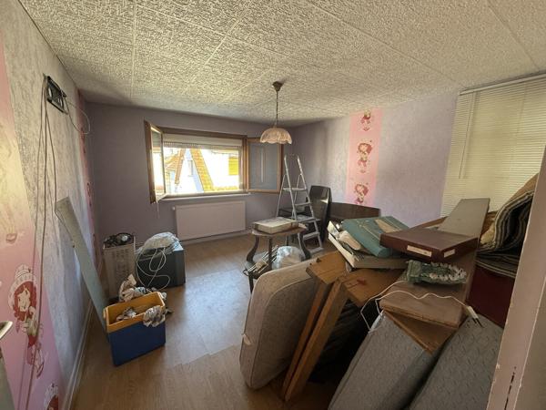 Maison d'environ 90 m² sur un terrain de 5,6 ares avec dépendances