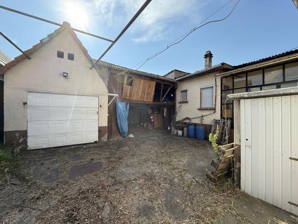 Maison d'environ 90 m² sur un terrain de 5,6 ares avec dépendances