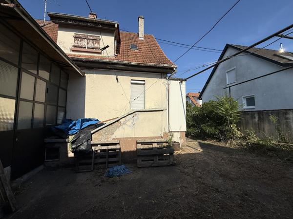 Maison d'environ 90 m² sur un terrain de 5,6 ares avec dépendances