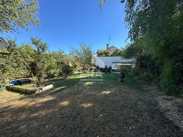 Maison familiale de caractère aux beaux volumes à Franconville