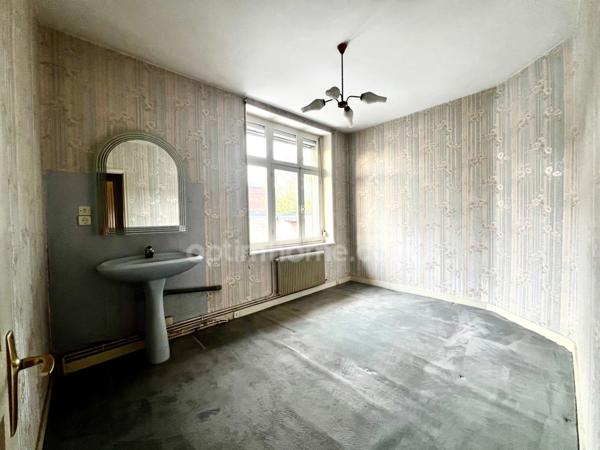 Maison semi-mitoyenne 3 chambres avec garage et jardin