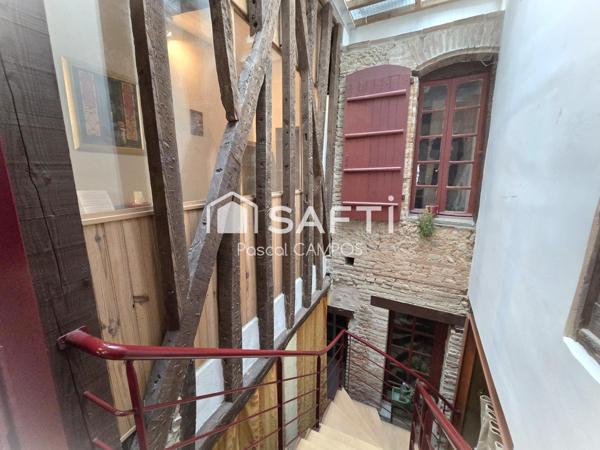 Maison de ville de 205 m² avec garage et jardin