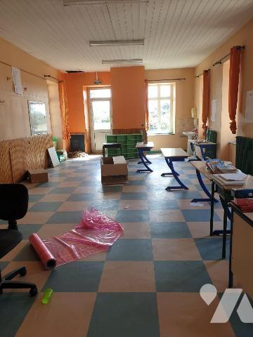 Un ensemble immobilier (ancienne école privée) composé comme suit :
-	Un premier bâtiment en p...