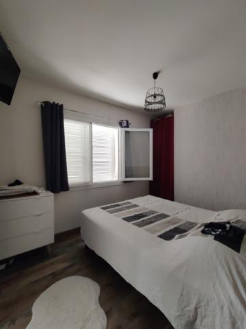 Maison  5 pièce(s)  4 chambre(s)  100 m²