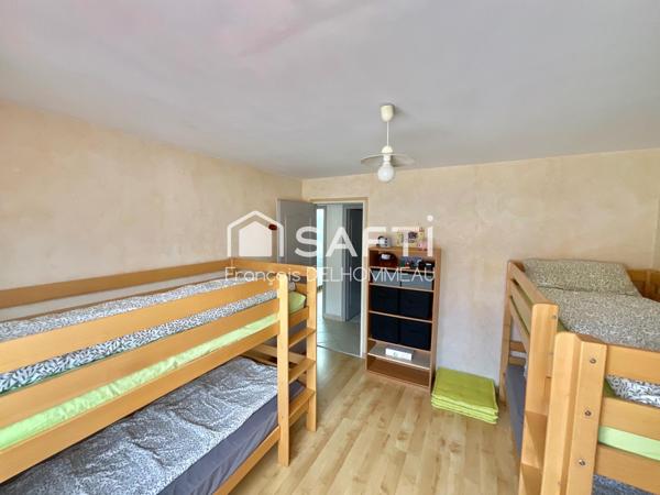 Maison de plain-pied 121m2, 3 chambres, 1 mezzanine, 1 garage proche du centre de Mouilleron