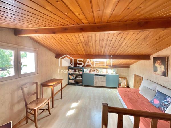 Maison de plain-pied 121m2, 3 chambres, 1 mezzanine, 1 garage proche du centre de Mouilleron