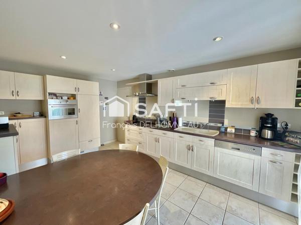 Maison de plain-pied 121m2, 3 chambres, 1 mezzanine, 1 garage proche du centre de Mouilleron