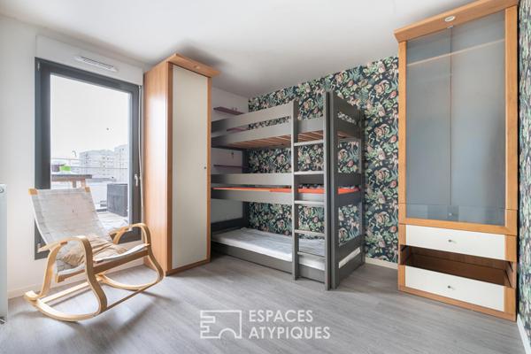 Appartement en étage élevé avec terrasse plein ciel