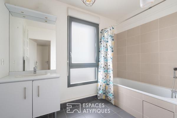 Appartement en étage élevé avec terrasse plein ciel
