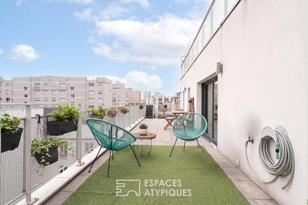 Appartement en étage élevé avec terrasse plein ciel