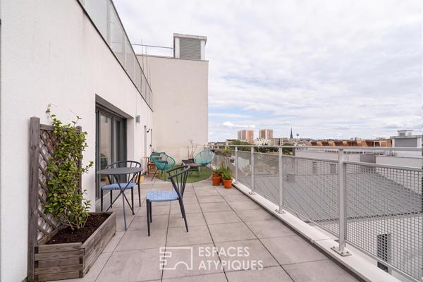 Appartement en étage élevé avec terrasse plein ciel