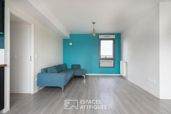 Appartement en étage élevé avec terrasse plein ciel