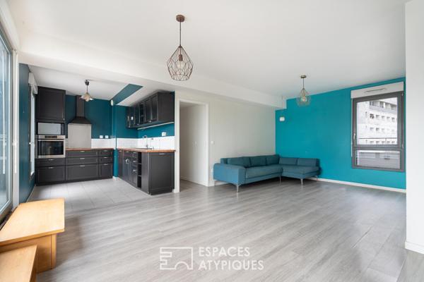 Appartement en étage élevé avec terrasse plein ciel