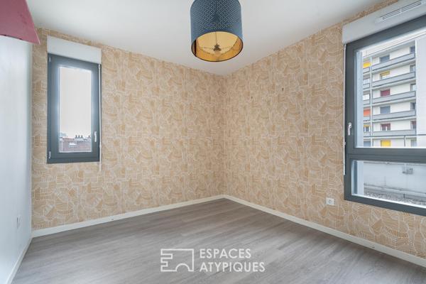 Appartement en étage élevé avec terrasse plein ciel