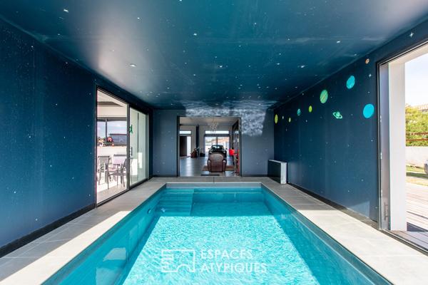Maison contemporaine avec piscine intérieure