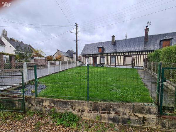 YVETOT,  maison divisée en 2 logements loués, 2 garages, terrain