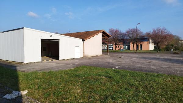 Local commercial de 230 m² à vendre - Fains Veel - magasin avec réserve et parking privé.