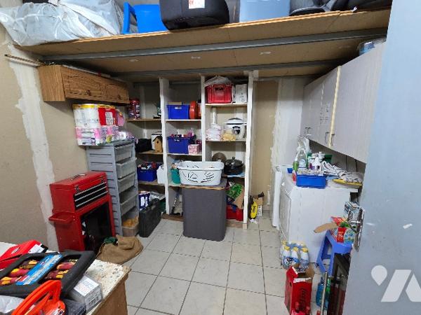 YVETOT, pavillon de plain pied d'~99 m², sur terrain d'~800 m², trois chambres, garage, carport.