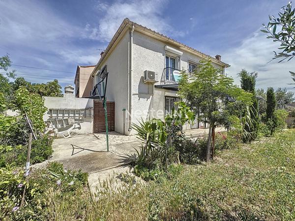 Maison de 136.51 m2 à Perpignan 6 pièces, 3 faces avec garage et jardin