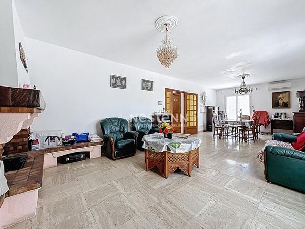 Maison de 136.51 m2 à Perpignan 6 pièces, 3 faces avec garage et jardin