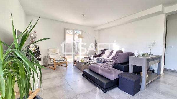 Maison individuelle d'environ 100m² avec garage fermé sur un terrain clôturé - 3 chambres