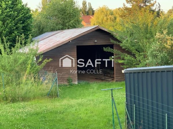 Maison type F6 sur sous-sol avec garage , jardin, hangar et studio indépendant