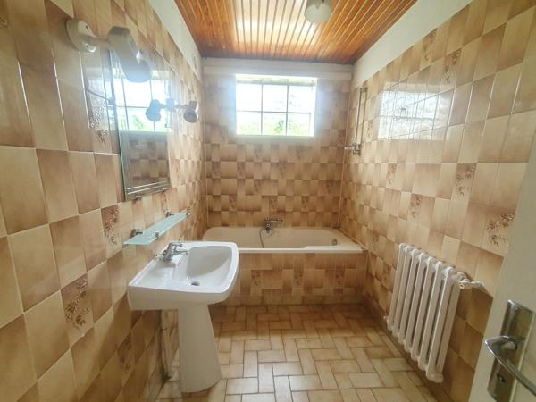 Maison de 163 m² et sa dépendance de 64 m².