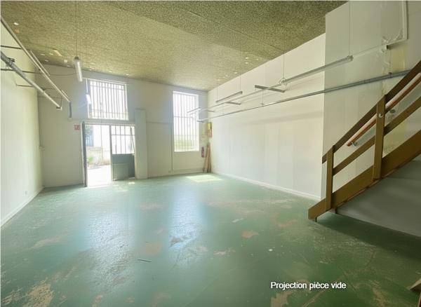 Local d'activité à transformer en loft de 70 m2