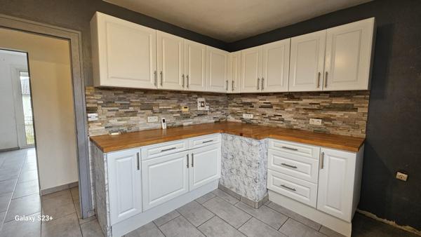 Maison sur sous-sol semi enterré NIORT quartier Rte d'Aiffres