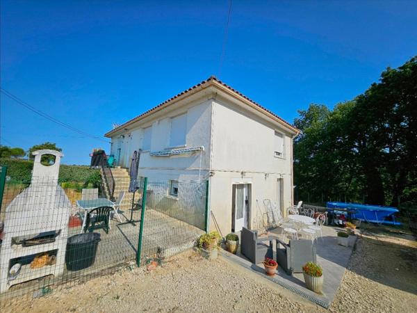 MAISON DIVISÉE EN DEUX APPARTEMENTS AVEC JARDIN