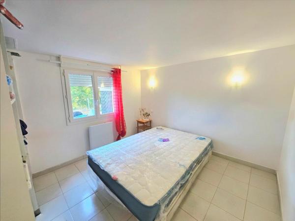 MAISON DIVISÉE EN DEUX APPARTEMENTS AVEC JARDIN