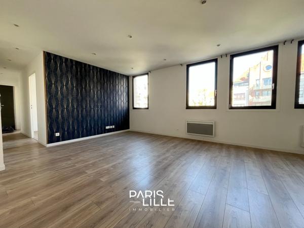 Appartement rénové avec cave et parking
