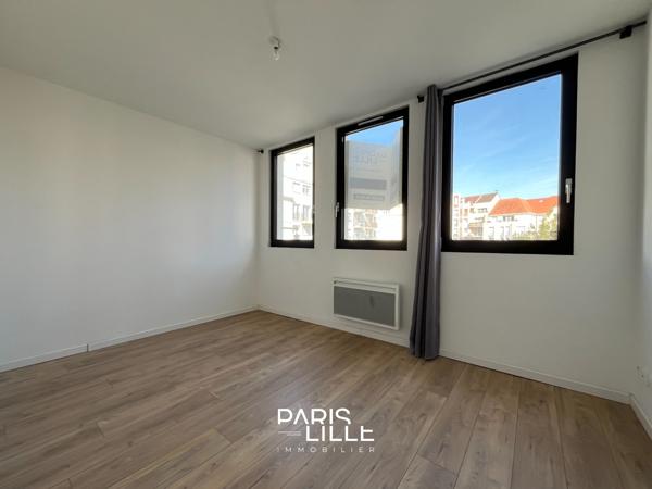 Appartement rénové avec cave et parking