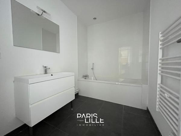 Appartement rénové avec cave et parking