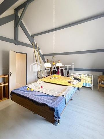 Maison 5 chambres, bien entretenue.